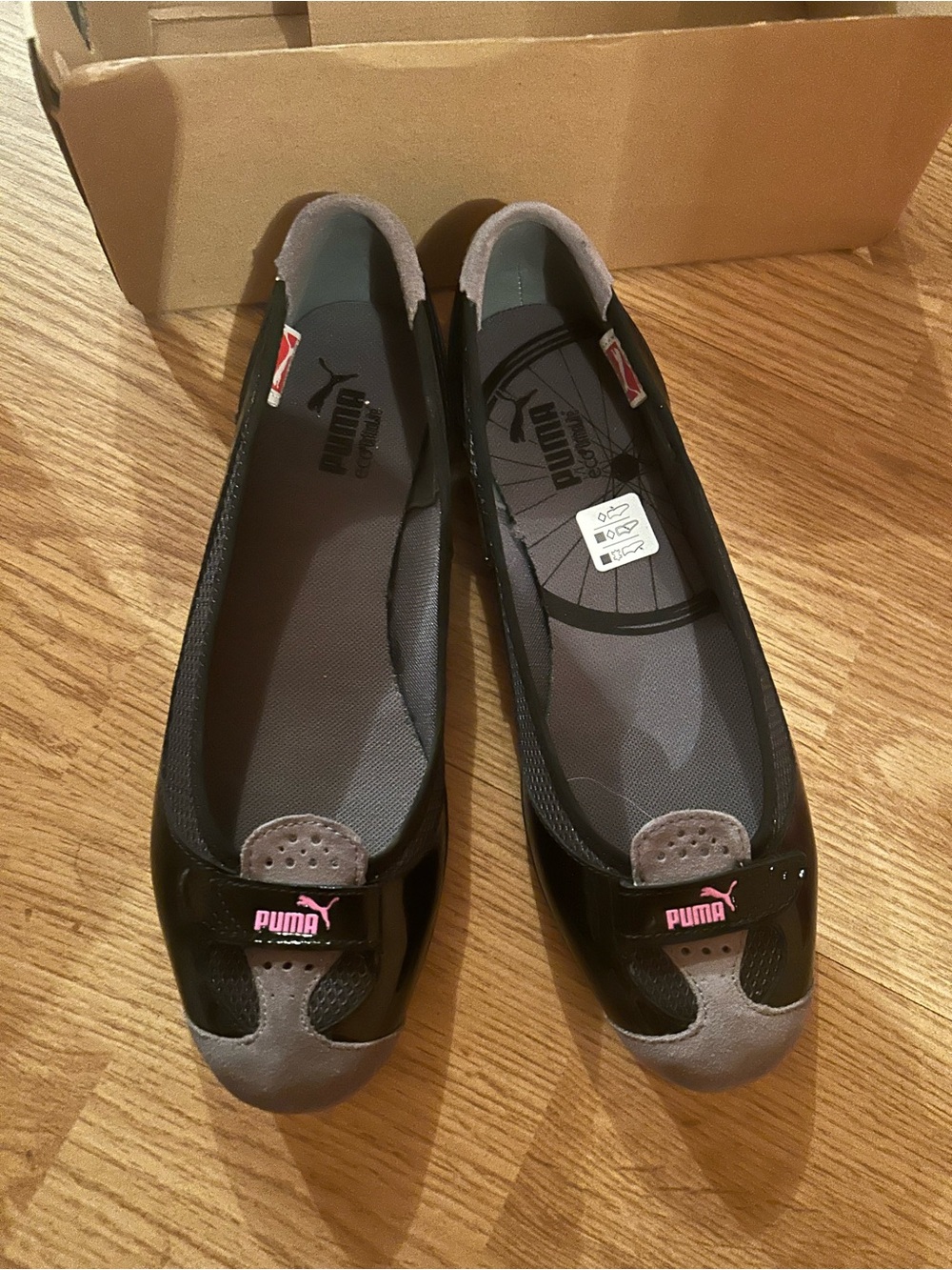 Puma Women's Black Flats with Gray Accents and Pink Logo